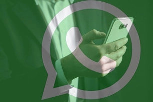 Hand Anzug Smartphone WhatsApp Logo grün
